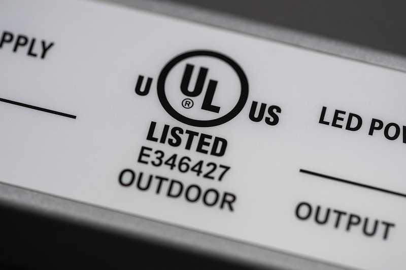 A close-up of a UL Listed mark clearly printed on the product label of an outdoor LED power supply.