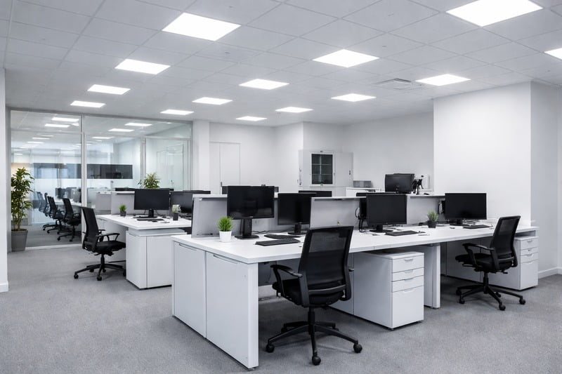Photo: A modern office space with linear 4000K lighting giving a clean, crisp, productive look.