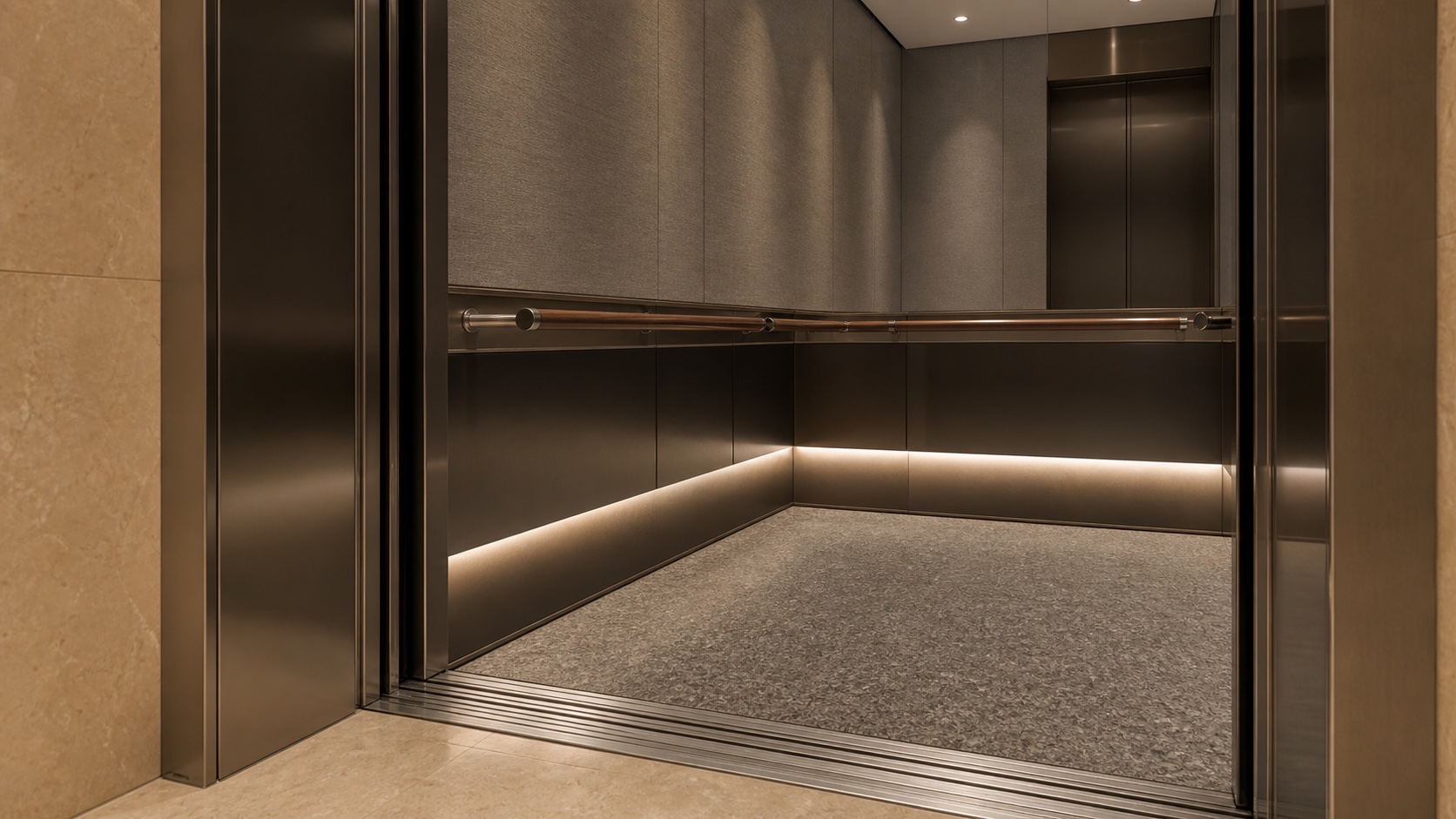Low-level linear LED lighting and visible threshold in a modern elevator cabin