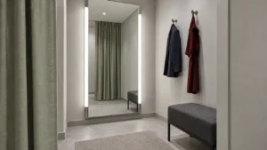 Retail fitting-room concept with two vertical diffused light lines beside a full-length mirror